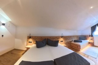 alpenstern_nauders_ferienwohnung_alpenjuwel_doppelbett.jpg